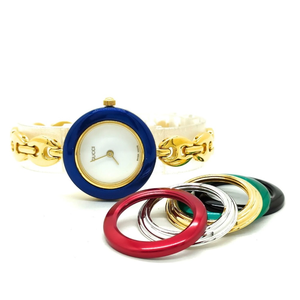 Gucci women watch vintage bezel change 27mm gold plated